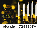 International holocaust remembrance day, Star of David and Minor candlestick on dark background 72458050