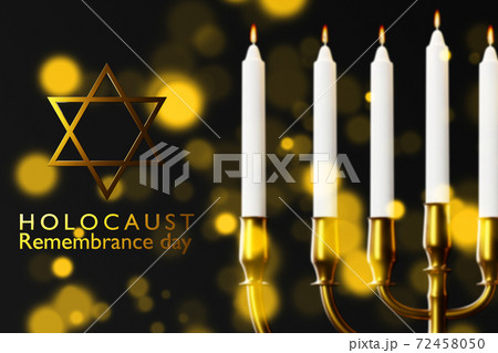 International holocaust remembrance day, Star of David and Minor candlestick on dark background 72458050