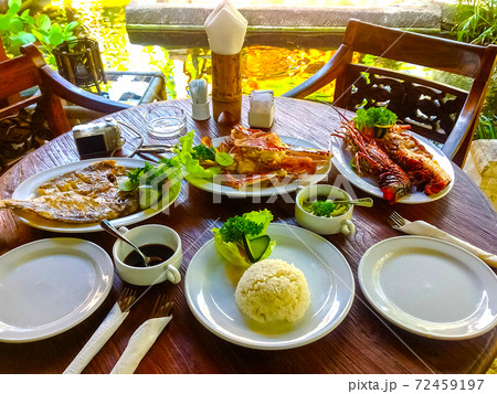 Balinese Jimbaran beach famous for it's perfect sea food restaurants 72459197
