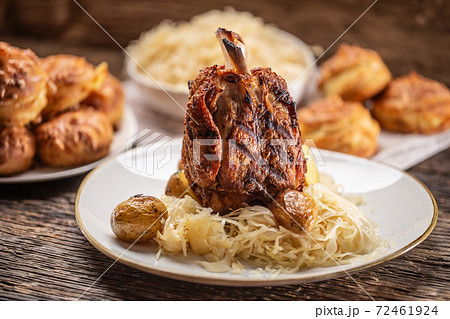 Bavarian pork knuckle with sauerkraut and baked Bavarian pork knuckle with sauerkraut and baked 72461924