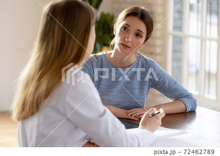 Female patient have consultation with woman doctor Female patient have consultation with woman doctor 72462789