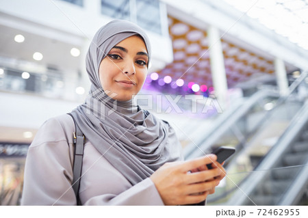 Smiling Middle-Eastern Woman in Shopping Mall 72462955