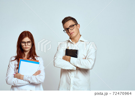 business man and woman secretary documents employees colleagues on light background cropped view 72470964
