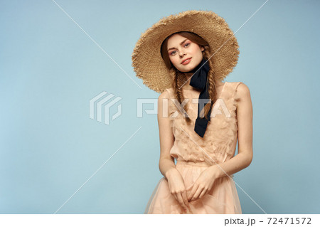 girl in a pink dress on a blue background gesturing with her hands romance emotions cropped view girl in a pink dress on a blue background gesturing with her hands romance emotions cropped view 72471572