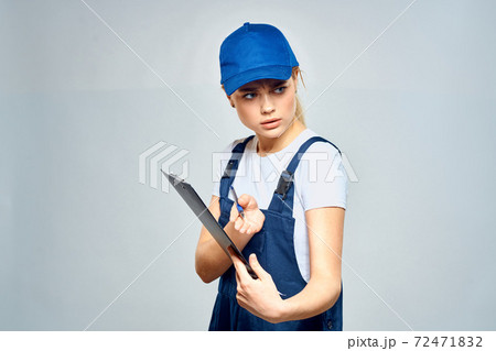 Woman courier in uniform documents service delivery 72471832