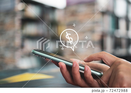 Woman use gadget mobile smartphone earn money online with dollar icon pop up. Business fintech technology on smartphone. Woman use gadget mobile smartphone earn money online with dollar icon pop up. Business fintech technology on smartphone. 72472988