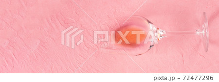 Rose wine panorama, shot from above on a pink background with a place for text 72477296