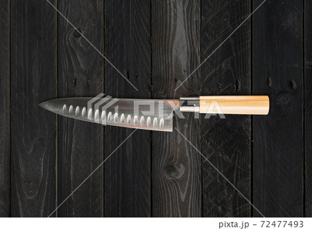 Traditional Japanese gyuto chief knife on concrete background 72477493
