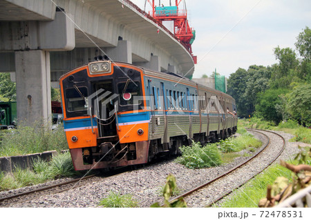 Train running on rails in Thailand, metal railway of train parallel with railway of Electric train. Train running on rails in Thailand, metal railway of train parallel with railway of Electric train. 72478531