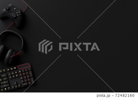 Top view of gamer workspace and gear like mouse, keyboard, joystick, headset Top view of gamer workspace and gear like mouse, keyboard, joystick, headset 72482160