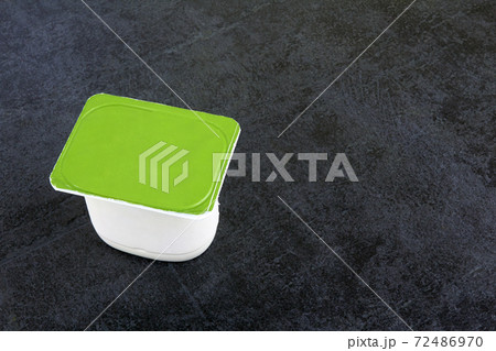 Fruit yogurt on stone 72486970