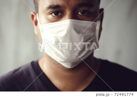 New normarl man wearing a mask To prevent the coronavirus outbreak 72491774