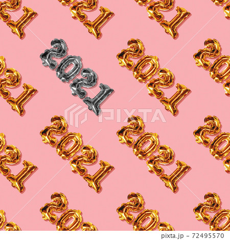 Happy New year 2021 celebration. Bright gold balloons figures, New Year Balloons with glitter on yellow pattern. Christmas and new year celebration. Gold foil balloon 2021 gift pattern 72495570