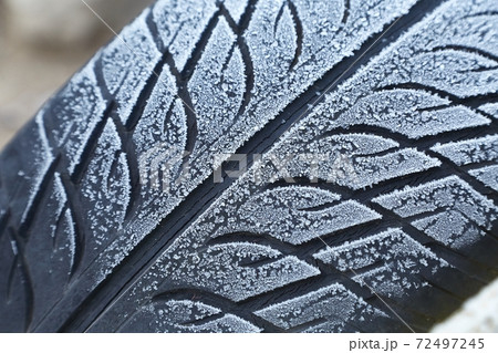 Abandoned Car Tyre in winter 72497245