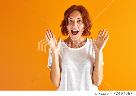 happy excited woman is happy to get good news 72497667