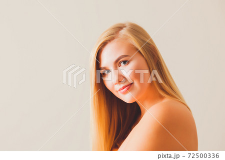 The happy young blonde woman with beautiful skin 72500336
