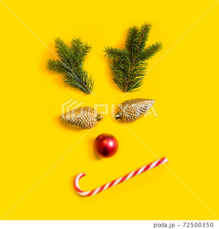 Sarcastic face arranged from Christmas related items Sarcastic face arranged from Christmas related items 72500350