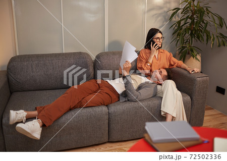 Contemporary Couple Working at Home 72502336