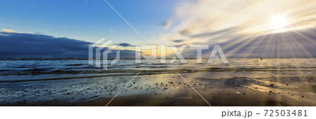 Sunset on Crosby Beach in winter, Crosby, Liverpool, United Kingdom Sunset on Crosby Beach in winter, Crosby, Liverpool, United Kingdom 72503481