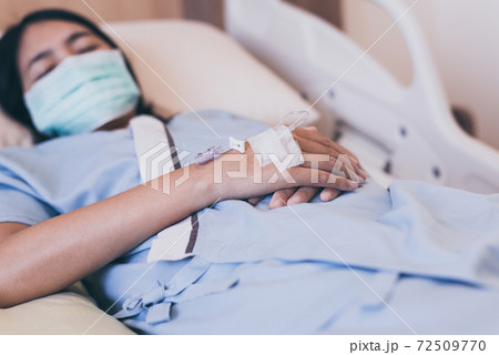 Close up of hands patient woman during sleeping on sickbed at the hospital Close up of hands patient woman during sleeping on sickbed at the hospital 72509770