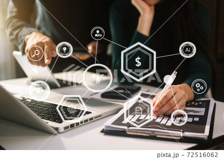 Team of business analysts discussing working new start up project. in contemporary office room Team of business analysts discussing working new start up project. in contemporary office room 72516062