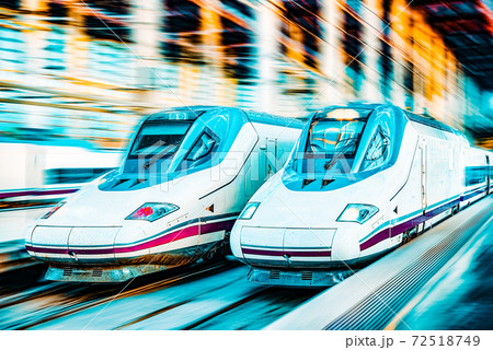 Modern hi-speed passenger train, in  movement (motion). 72518749