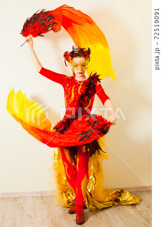Grace and expression while performing an exotic dance Grace and expression while performing an exotic dance 72519091