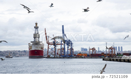 Seaport with cargo ship in Istanbul, Turkey Seaport with cargo ship in Istanbul, Turkey 72521109