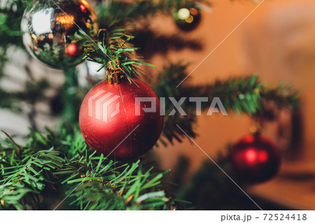 Beautiful decorated fireplace and Christmas tree at cottage. Beautiful decorated fireplace and Christmas tree at cottage. 72524418