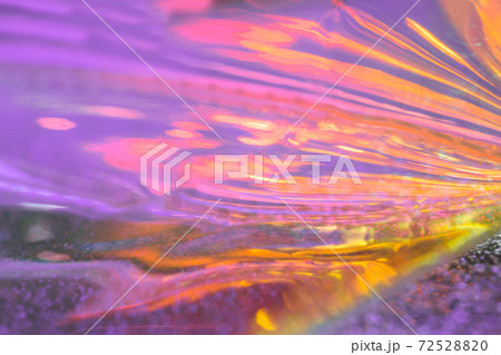 Abstract iridescent lilac yellow fluid reflections background Abstract iridescent lilac yellow fluid reflections background 72528820