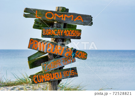 A distance sign at Lomma Beach, Scania, Sweden A distance sign at Lomma Beach, Scania, Sweden 72528821