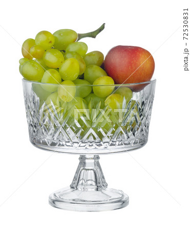 Glass fruit bowl / storage container isolated on white 72530831
