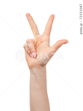 Female hand showing three fingers on white background Female hand showing three fingers on white background 72531087