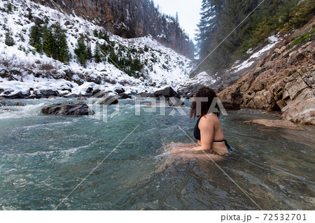 Caucasian Girl swimming in the Ice Cold Freezing Glacier River Caucasian Girl swimming in the Ice Cold Freezing Glacier River 72532701