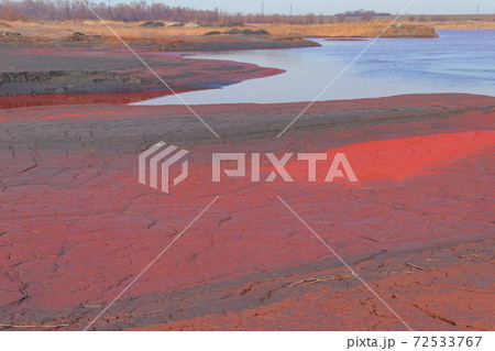 Technical settler of industrial water of mining industry with red soil polluted with iron ore waste in Kryvyi Rih, Ukraine 72533767