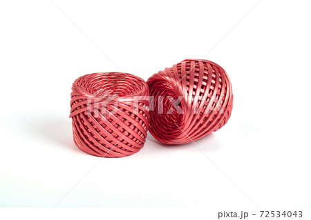 Shiny cotton kntting elastic yarn on white background Shiny cotton kntting elastic yarn on white background 72534043