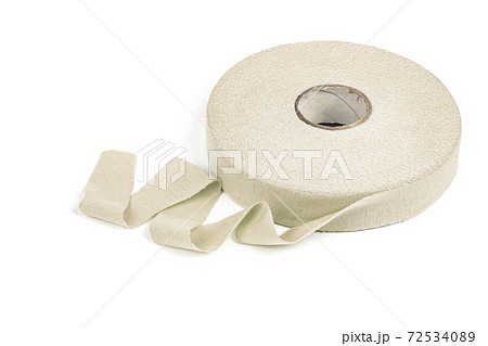 elastic knitted tape yarn for crochet on white background rolled up. elastic knitted tape yarn for crochet on white background rolled up. 72534089