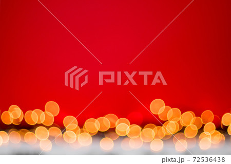 Abstract blurred bokeh lights on red background. Christmas and new year holidays light 72536438