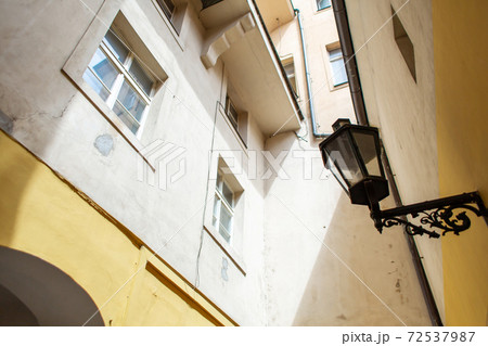 The architecture of the old city of Prague. Retro gothic street lamp for street lighting. Photo in the afternoon. 72537987