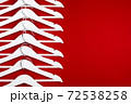White hangers on a red background. Sales clothes concept. 72538258