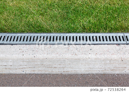 iron drainage system, close up of an iron grille. 72538264