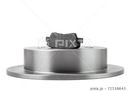 set of brake pad and brake disc with highlights, new car spare parts brakes for a vehicle isolated on a white background, nobody. 72538643