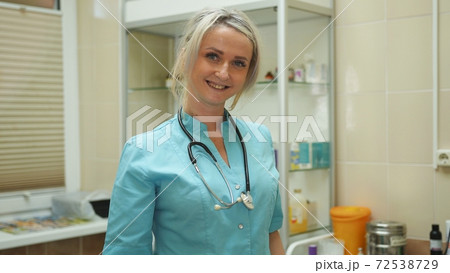 Portrait of a smiling female doctor at vet clinic Portrait of a smiling female doctor at vet clinic 72538729