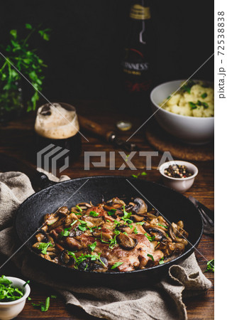 Fried pork neck steak with different mushrooms Fried pork neck steak with different mushrooms 72538838
