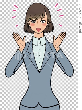 両手を顔に近づけながら喜んでいるスーツの女性 72542503