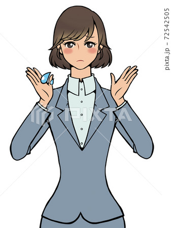 両手を顔に近づけながらとても困っているスーツの女性 72542505