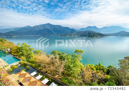 The aerial view of Sun Moon Lake with swimming pool and resort villa in Yuchi Township, Nantou, Taiwan. 72543482