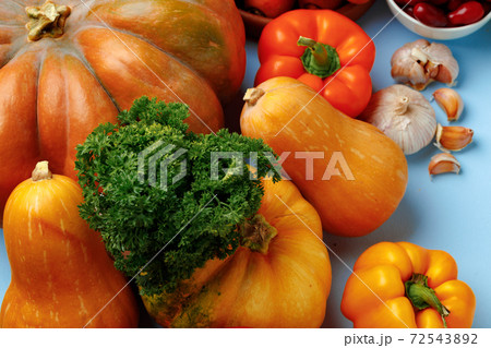 Beautiful assortment of colorful vegetables on blue background 72543892