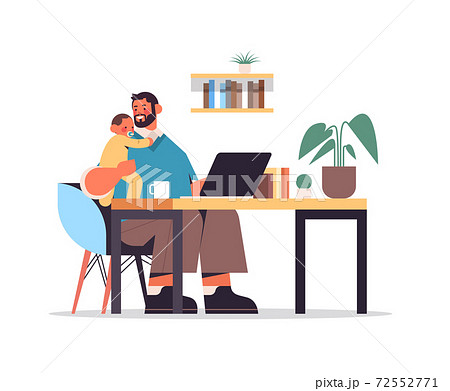 young father with little son sitting at workplace fatherhood concept dad spending time with his kid full length 72552771