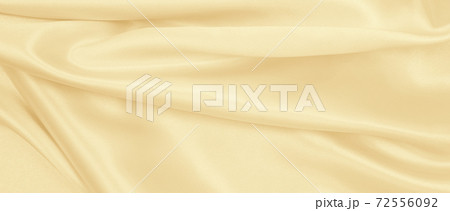 Smooth elegant golden silk or satin luxury cloth texture as wedding background. Luxurious background design. In Sepia toned. Retro style Smooth elegant golden silk or satin luxury cloth texture as wedding background. Luxurious background design. In Sepia toned. Retro style 72556092